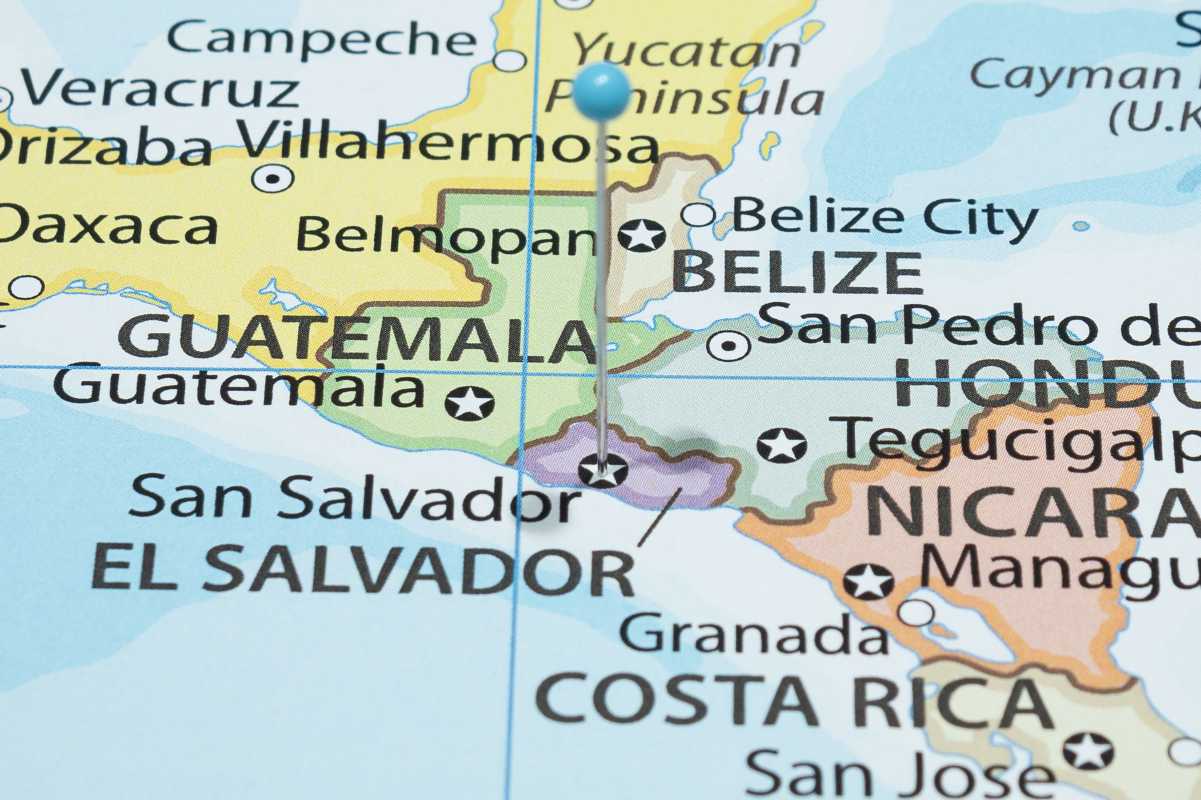 Stock photo of a map with a pin on San Salvador, El Salvador