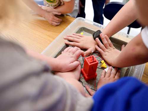 Hands on learning! Photo Credit: Eric Larson, Flash Point, SLC